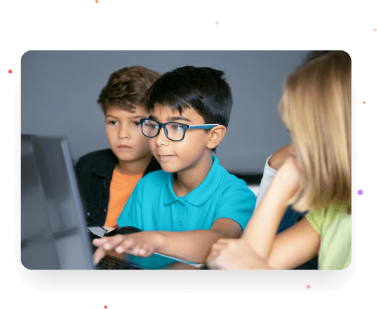 Child learning to code on a laptop